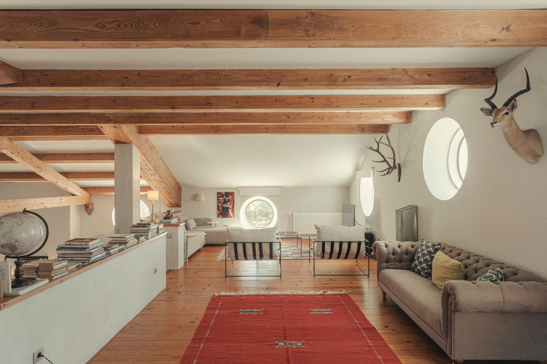 Loft lounge under exposed beams